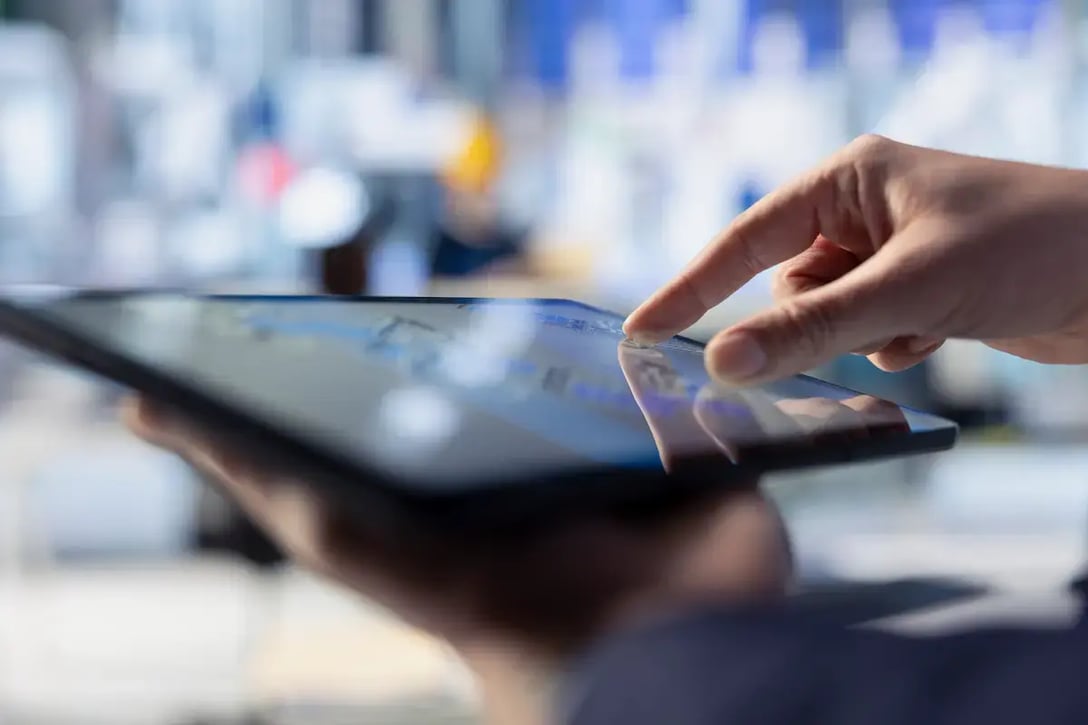 Blog Image - Operator Using tablet to study Data