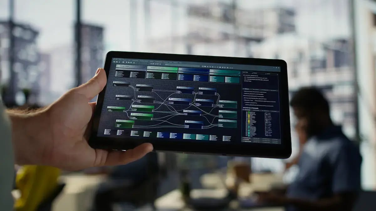 close-up-admin-office-sing-tablet-design-machine-learning-algorithms